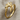 Wrap bat wing ring, gold vermeil, angled view on fabric