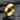 Close-up of freedom star ring resting on dark stone showcasing the crisp inner text and star engraving