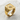 Close-up of the handcrafted playing card ring resting on white stone, highlighting the honeycomb interior and side spade.
