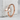 Whale Tail Ring, rose gold, product view on concrete block