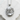 Baby girl pendant, polished silver finish, front view on stone