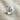 Growling Tiger Ring, polished, three-quarter view on textured fabric