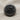 I Love Beer Cap Ring, black rhodium plated, top-down view on fabric