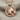 Horse Medallion Pendant, rose plated silver, front view on fabric