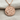 Moon and Stars Medallion Pendant, rose gold, product photo on woven fabric