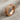 Celtic knotwork ring, rose plated silver, product view on linen