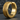 Close-up of gold vermeil beaded hoop earring on dark textured background highlighting the architectural brushed finish