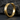 Modern grooved hoop earring with flat raised borders resting on dark textured stone highlighting its structural design