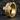 Premium sculpted gothic cross hoop earring resting on a dark textured stone background highlighting metalwork