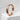Hammered Enso Ring, rose gold, standing on white stone ledge
