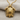 Gliding Sea Turtle Pendant, gold vermeil, product photo on fabric