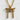 Close-up flat lay of the 925 sterling silver Japanese Torii gate pendant resting on a textured white stone surface