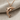Arched Dolphin Pendant, rose gold, product photo on linen
