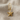 Starfish drop earring, gold vermeil, product photo on linen