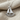 Hammered Sailboat Pendant, polished silver, product photo on linen