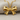 Bow Ribbon Pendant, gold vermeil, front view on fabric