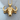 Close-up of the African buffalo pendant resting on a wooden surface highlighting premium craftsmanship.