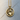 Close-up of the handcrafted 925 sterling silver Virgo zodiac pendant resting on a textured wooden surface