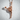 Rhythmic Gymnast Pendant, rose gold, front view against wall