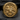 Close-up of Yatagarasu signet ring featuring oxidized sun-ray texture and raised polished three-legged crow design.