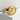 Great Wave Signet Ring in gold vermeil, angled view on stone