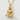 Angled close-up of the handcrafted 925 sterling silver Great Buddha pendant displayed on a textured white surface
