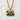 Hokkaido Bear Pendant, gold vermeil, front view on textured wall