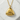 Smiling Onigiri Pendant, gold vermeil finish, front view on stone