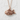 Taiyaki Fish Pendant, rose gold, front view on textured background