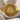 Helios Coin Ring, gold vermeil, product photo on fabric
