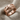 Bull Horn Ring, rose gold, product view on fabric