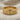 Göbeklitepe Animal Ring, gold vermeil, front view on fabric