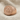 Hittite Seal Ring, rose gold, angled view on fabric