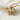 Terrier Dog Pendant, gold vermeil, product photo on linen