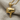 Thumbs Down Pendant, gold vermeil, product photo on fabric