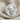 Jester Skull Ring, polished silver, angled product view on fabric