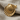 Scallop Shell Earring, gold vermeil finish, angled view on fabric