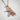 Tactical Gun Pendant, rose gold, angled product photo
