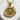 Close-up detail of Yin Yang Dragon Pendant with coiled dragon and balance symbol on white stone texture