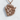 Woodland Moose Pendant, rose gold, front view against textured wall