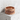 Renaissance Red Stone Ring, rose gold, product photo on stone plinth