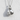 Tied Boxing Gloves Pendant, polished silver, product photo against textured wall