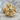Scottish Rite Lapel Pin, gold vermeil, angled view on stone