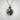 Persephone Split Pomegranate Pendant, black rhodium finish, front view on textured background