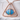 Oracle Eye Pendant, rose plated silver finish, front view on stone
