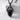Black onyx dragon claw pendant, black rhodium, front view on stone