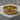Lord's prayer ring in gold vermeil, product photo on stone block