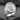 San Judas Signet Ring, polished silver, product photo on stone surface