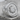Taino Sun Ring, polished silver finish on stone display