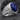 Special Forces Lapis Ring, polished silver, angled side view on rock